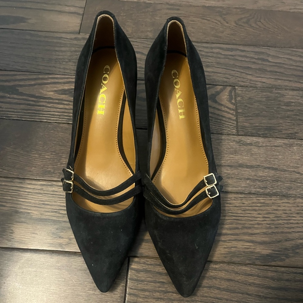 Black suede pumps